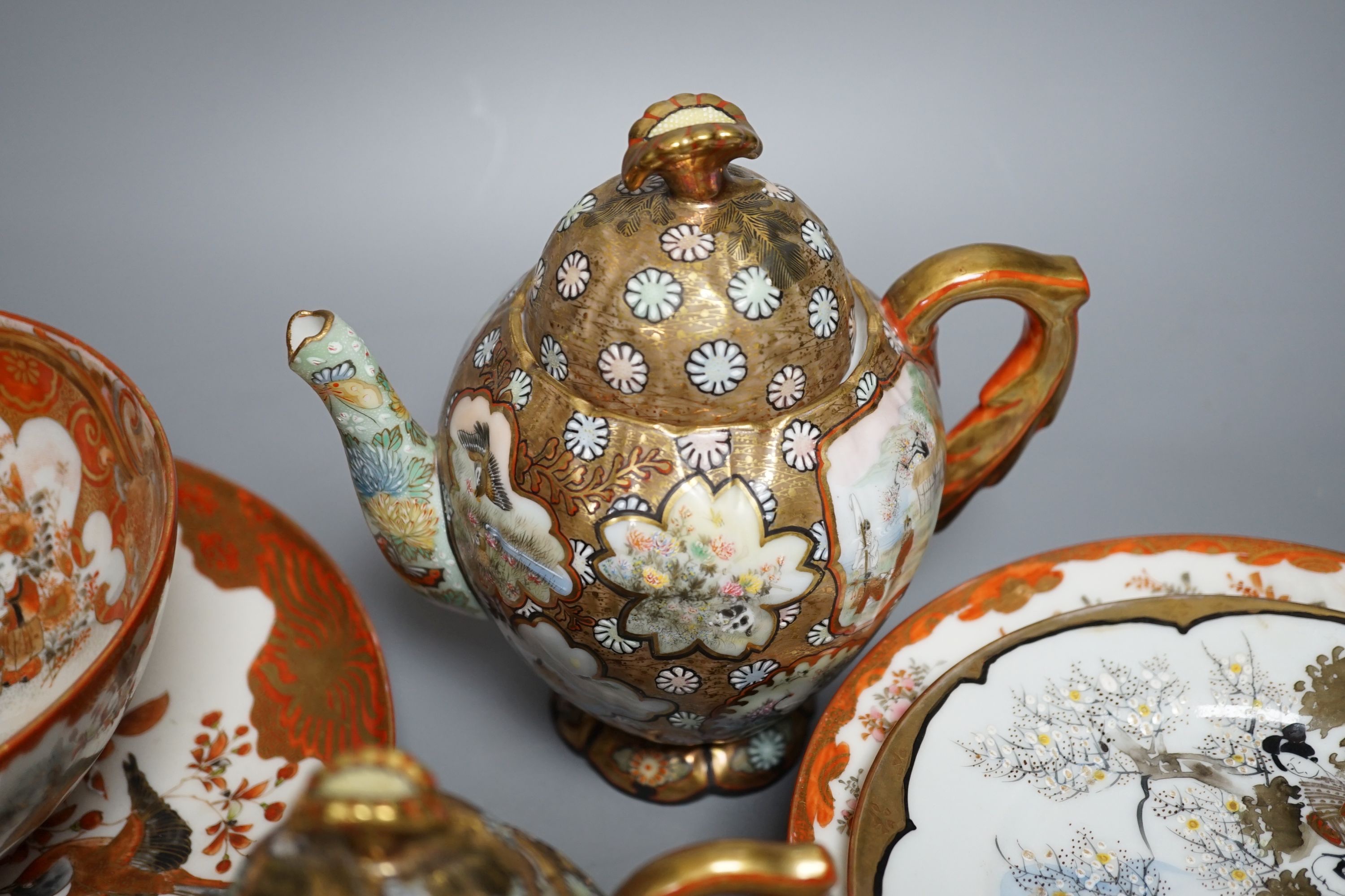 Kutani teawares and a Kutani decorative plate and bowl, Meiji -period, teapot and cover 17 cms high.